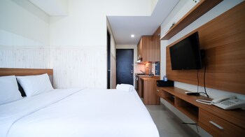 strategic and homey studio at tamasari papilio apartment