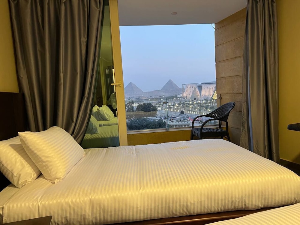 asia grand museum and pyramids view