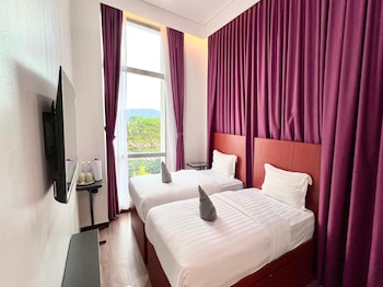 capital o 90985 margo hotel kk