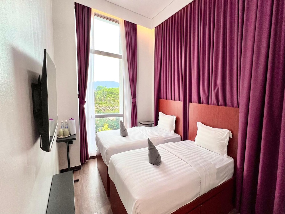 capital o 90985 margo hotel kk