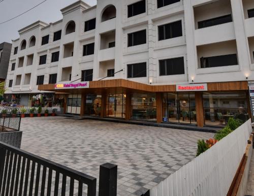 click hotel royal pearl galenda dahej