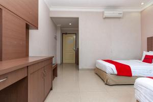 reddoorz premium hotel ratu residence