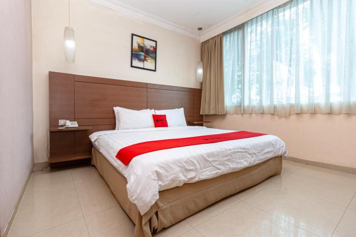 reddoorz premium hotel ratu residence