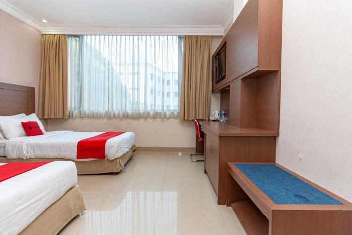 reddoorz premium hotel ratu residence