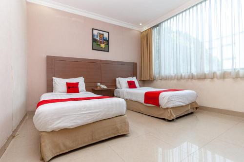 reddoorz premium hotel ratu residence