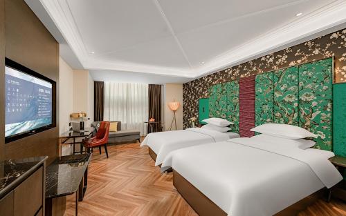 metropolo hotel xuzhou railway station jinlong lake metro station