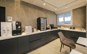 brown dot hotel pungam