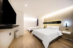 brown dot hotel pungam