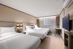 hanting hotel hangzhou central wulin square metro station