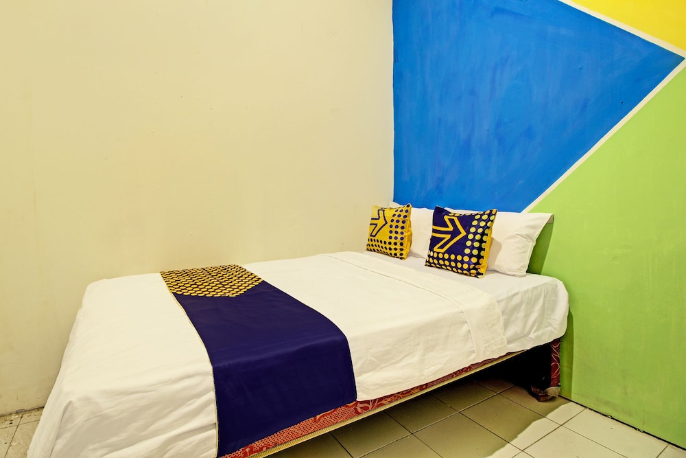 spot on 92531 pacar guesthouse