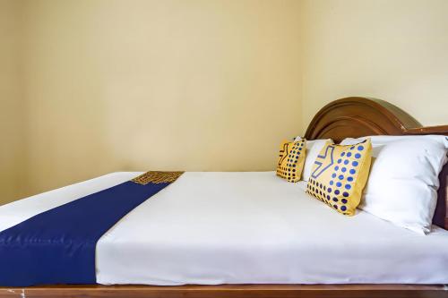 Spot On 93612 Kencana Homestay Syariah Near Masjid Al-Barokah Kanyuran,,2 star
