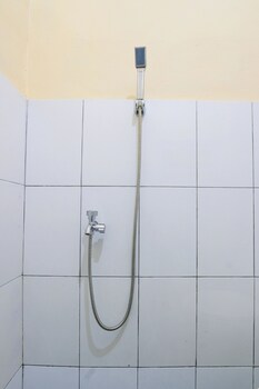 spot on 93988 guest house wijaya syariah