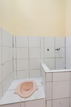 spot on 93988 guest house wijaya syariah