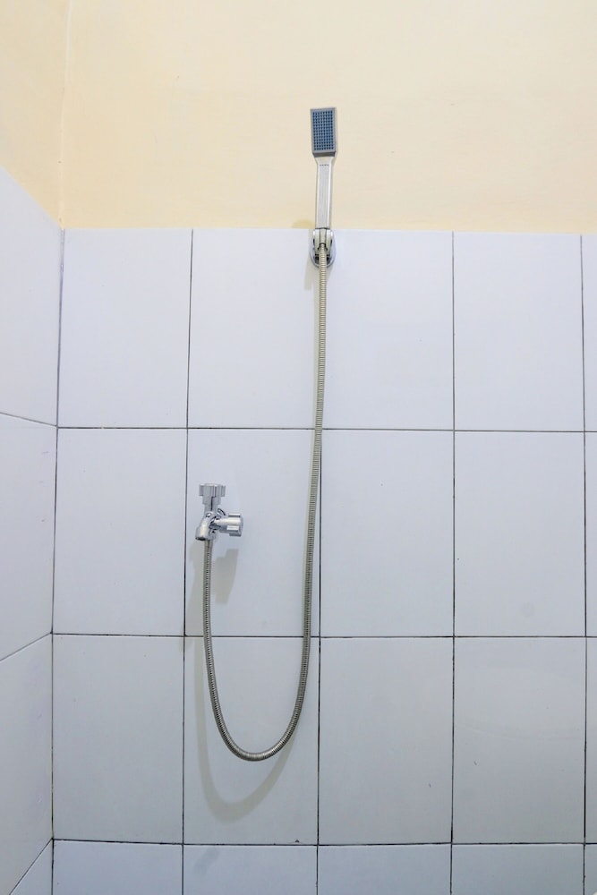 spot on 93988 guest house wijaya syariah