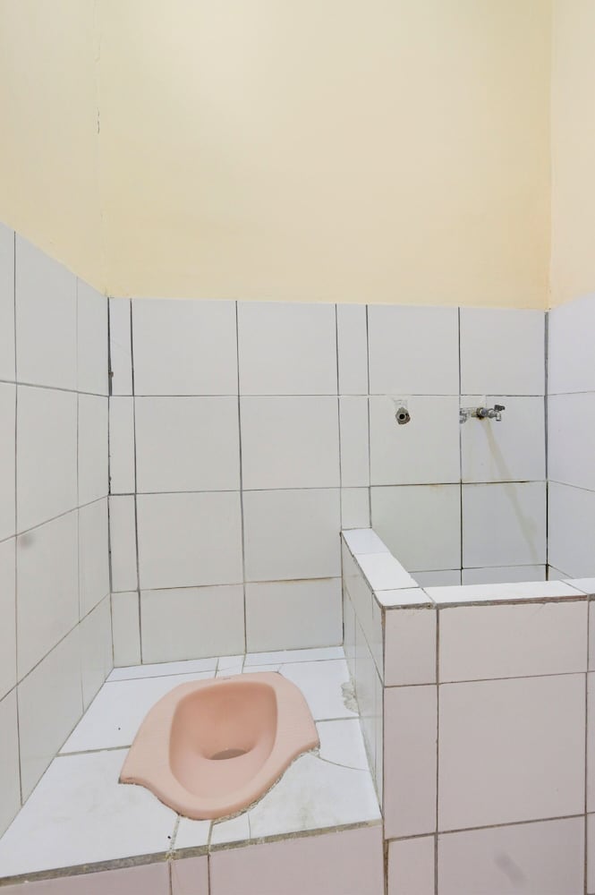 spot on 93988 guest house wijaya syariah