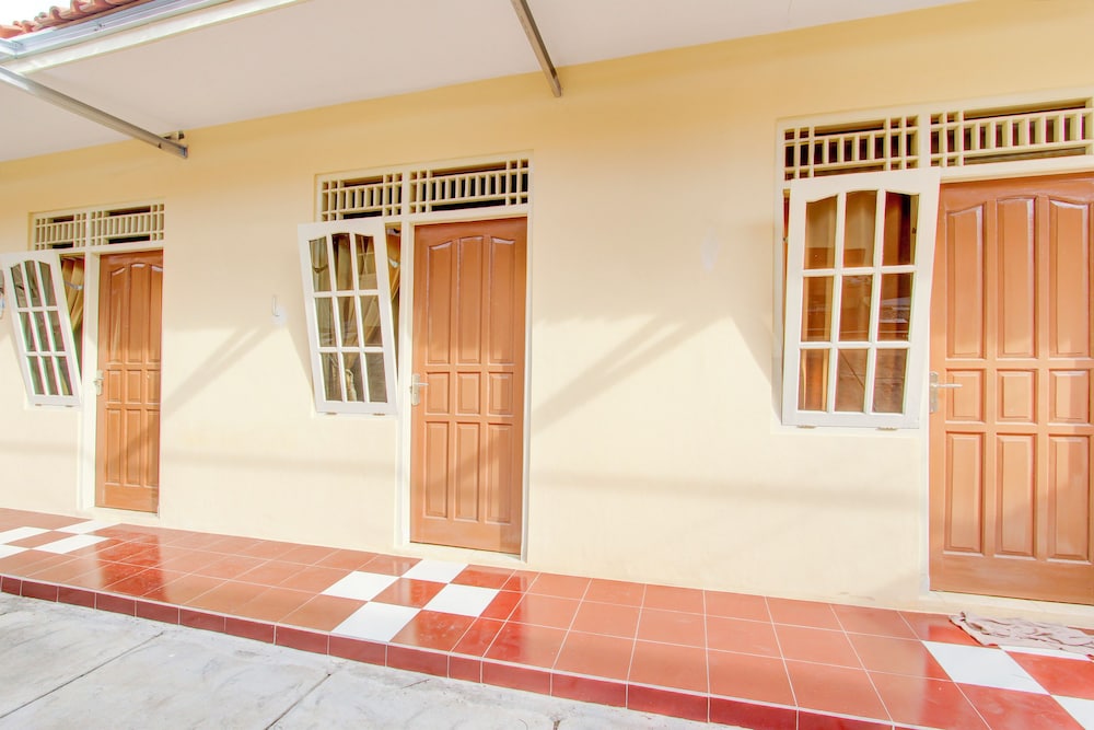 spot on 93988 guest house wijaya syariah