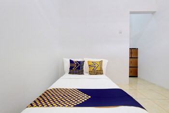 spot on 93988 guest house wijaya syariah