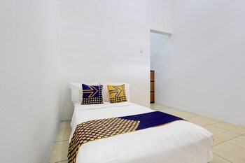 spot on 93988 guest house wijaya syariah