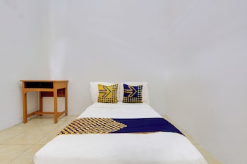 spot on 93988 guest house wijaya syariah