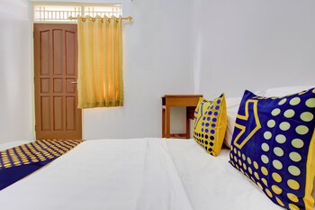 spot on 93988 guest house wijaya syariah