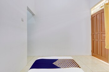 spot on 93988 guest house wijaya syariah