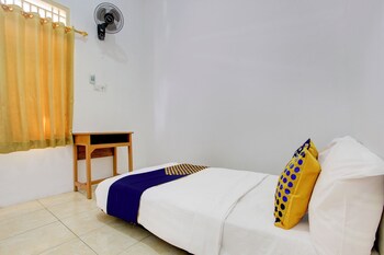 spot on 93988 guest house wijaya syariah