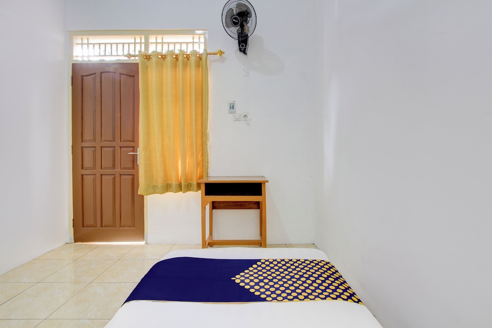 spot on 93988 guest house wijaya syariah