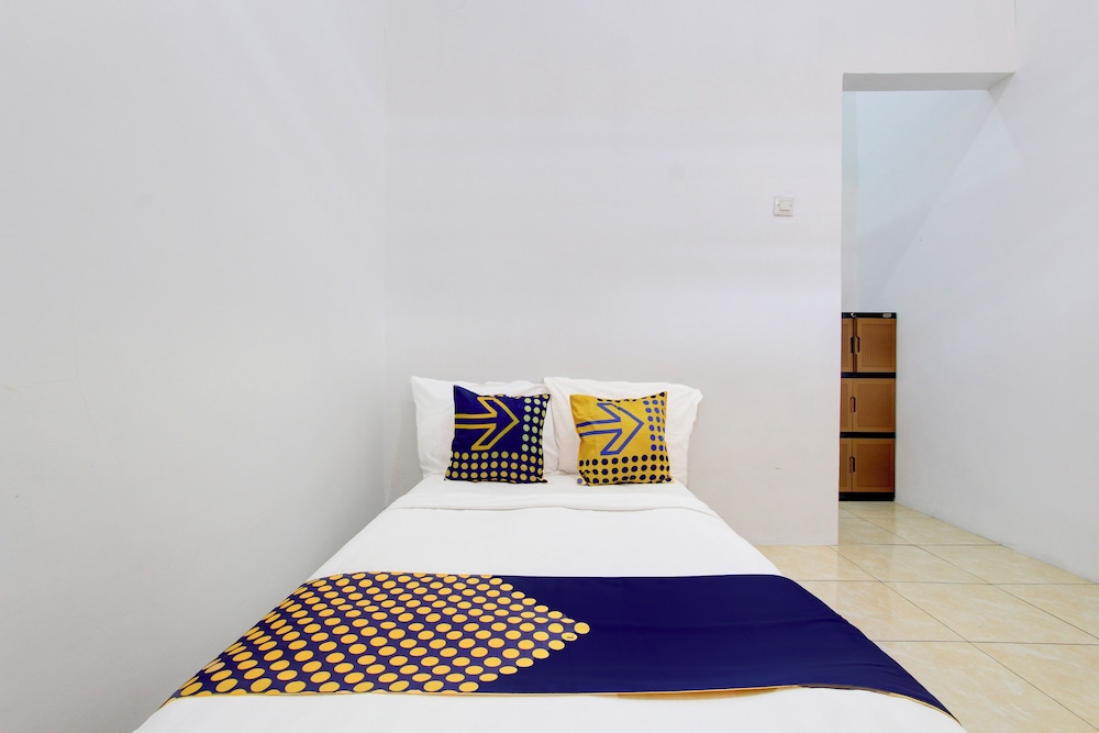 spot on 93988 guest house wijaya syariah