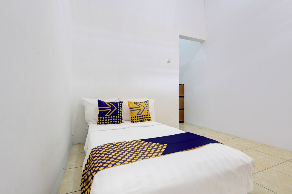 spot on 93988 guest house wijaya syariah