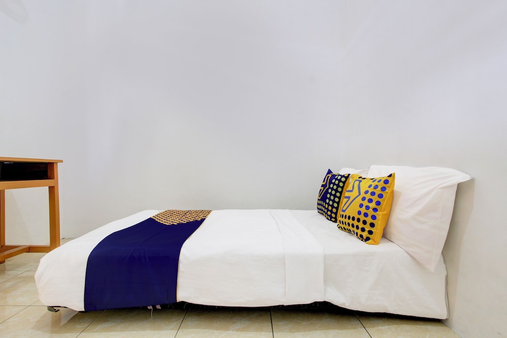 spot on 93988 guest house wijaya syariah