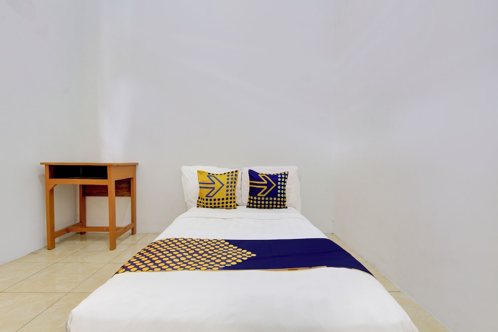 spot on 93988 guest house wijaya syariah