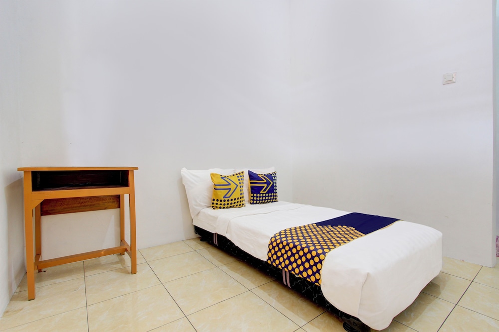 spot on 93988 guest house wijaya syariah