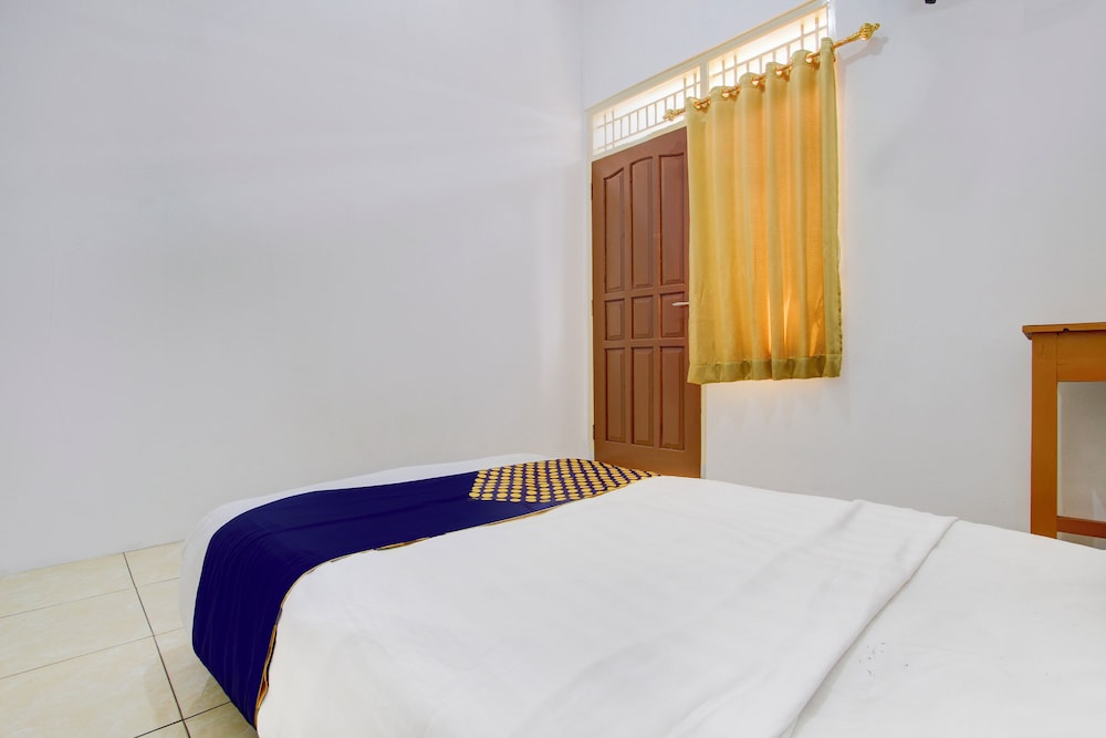 spot on 93988 guest house wijaya syariah