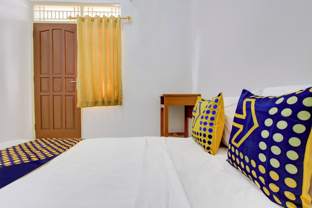 spot on 93988 guest house wijaya syariah