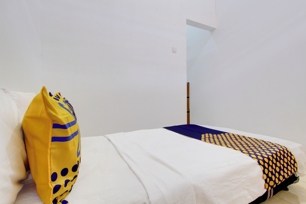 spot on 93988 guest house wijaya syariah