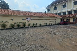 spot on 93988 guest house wijaya syariah