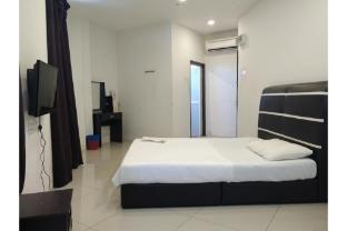 oyo 90995 hotel nk impian