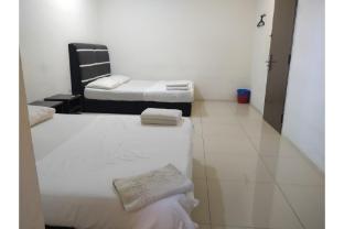 oyo 90995 hotel nk impian