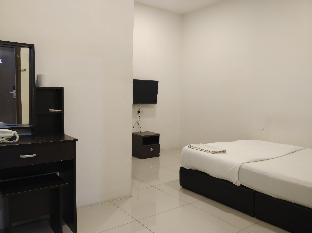 oyo 90995 hotel nk impian