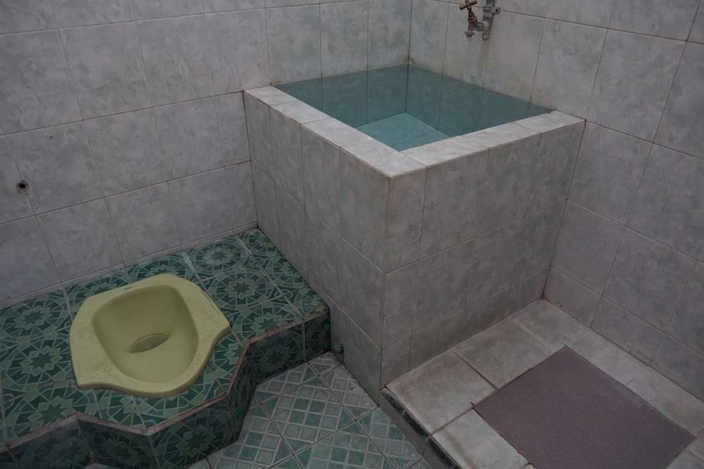 spot on 92665 yoko kost syariah