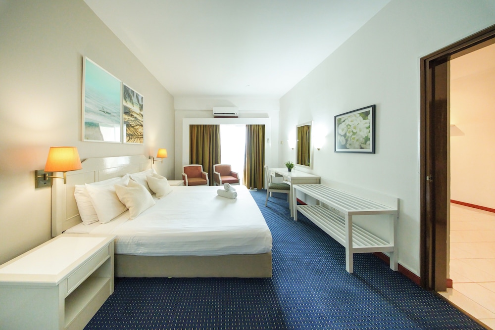 rainbow paradise beach resort