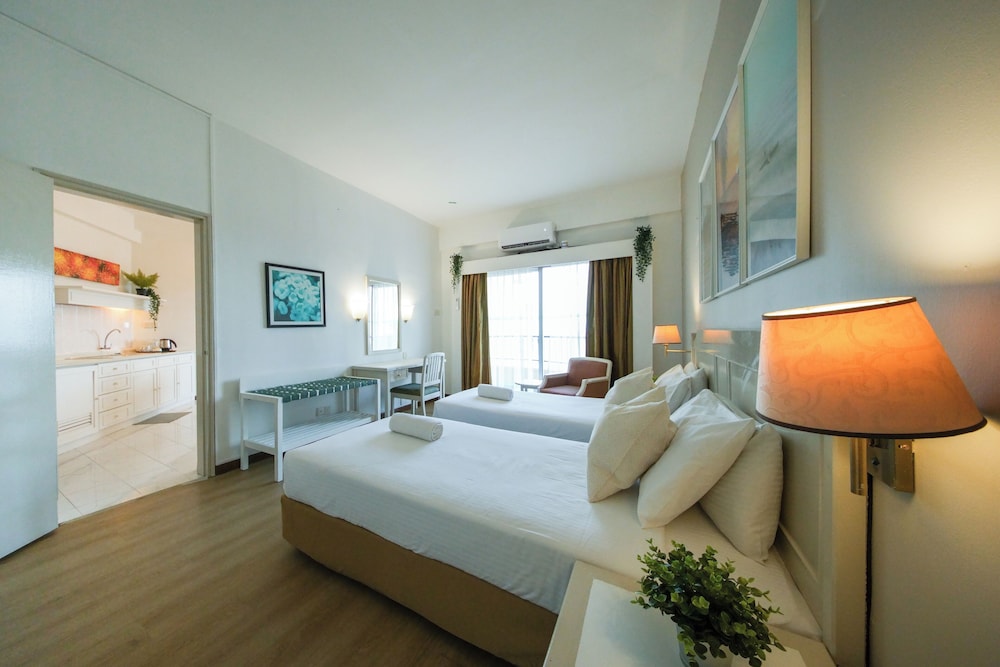 rainbow paradise beach resort