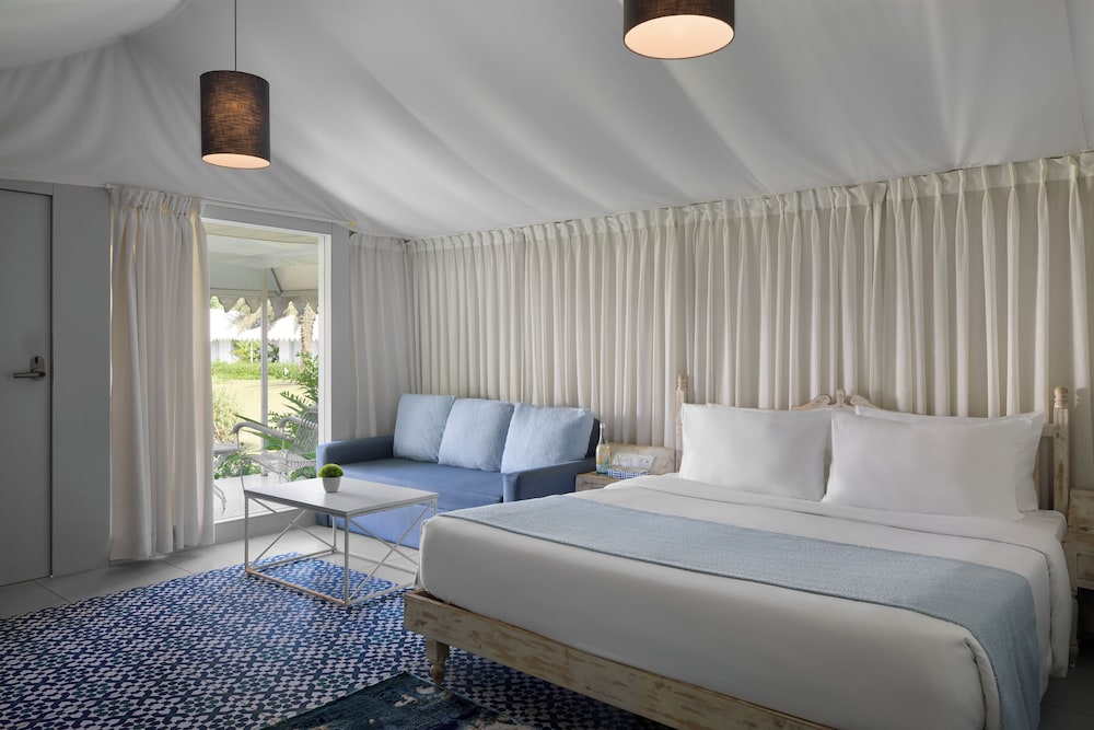 the fern seaside luxurious tent resort daman series by marriott