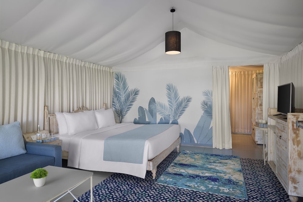 the fern seaside luxurious tent resort daman series by marriott