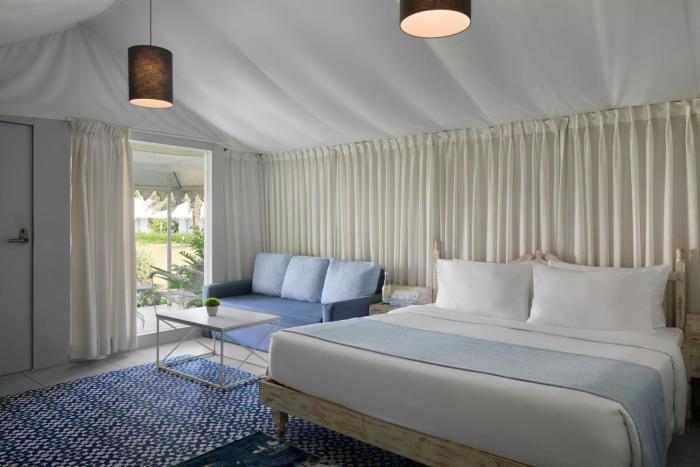 the fern seaside luxurious tent resort daman series by marriott