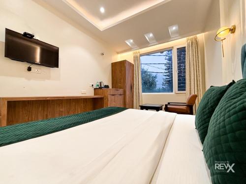 hotel green view behind pramarth niketan