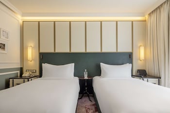 the emerald house lisbon curio collection by hilton