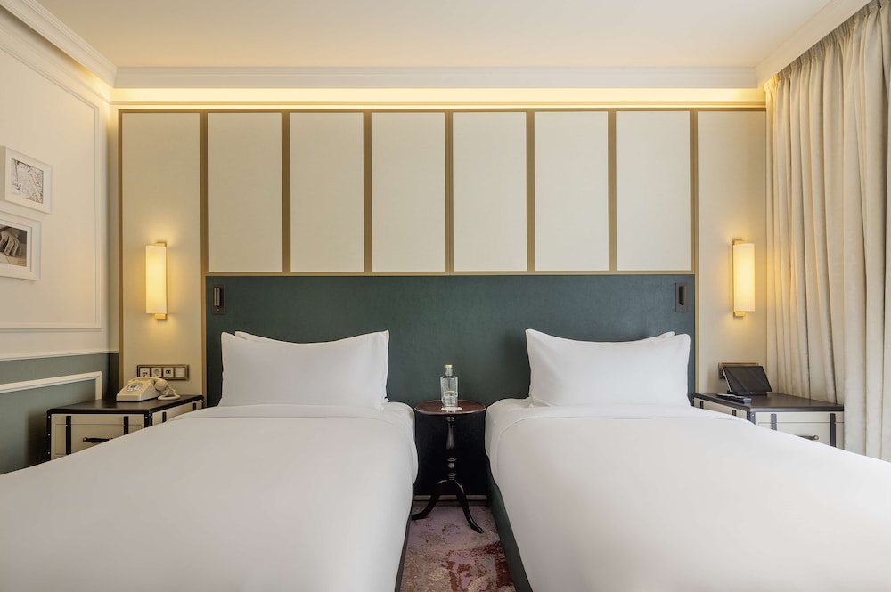 the emerald house lisbon curio collection by hilton