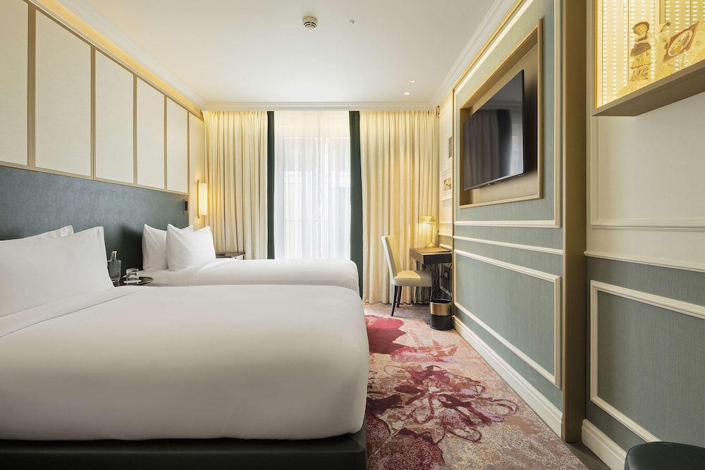 the emerald house lisbon curio collection by hilton