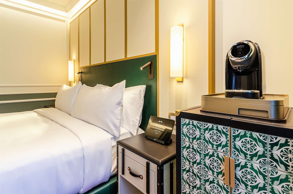 the emerald house lisbon curio collection by hilton